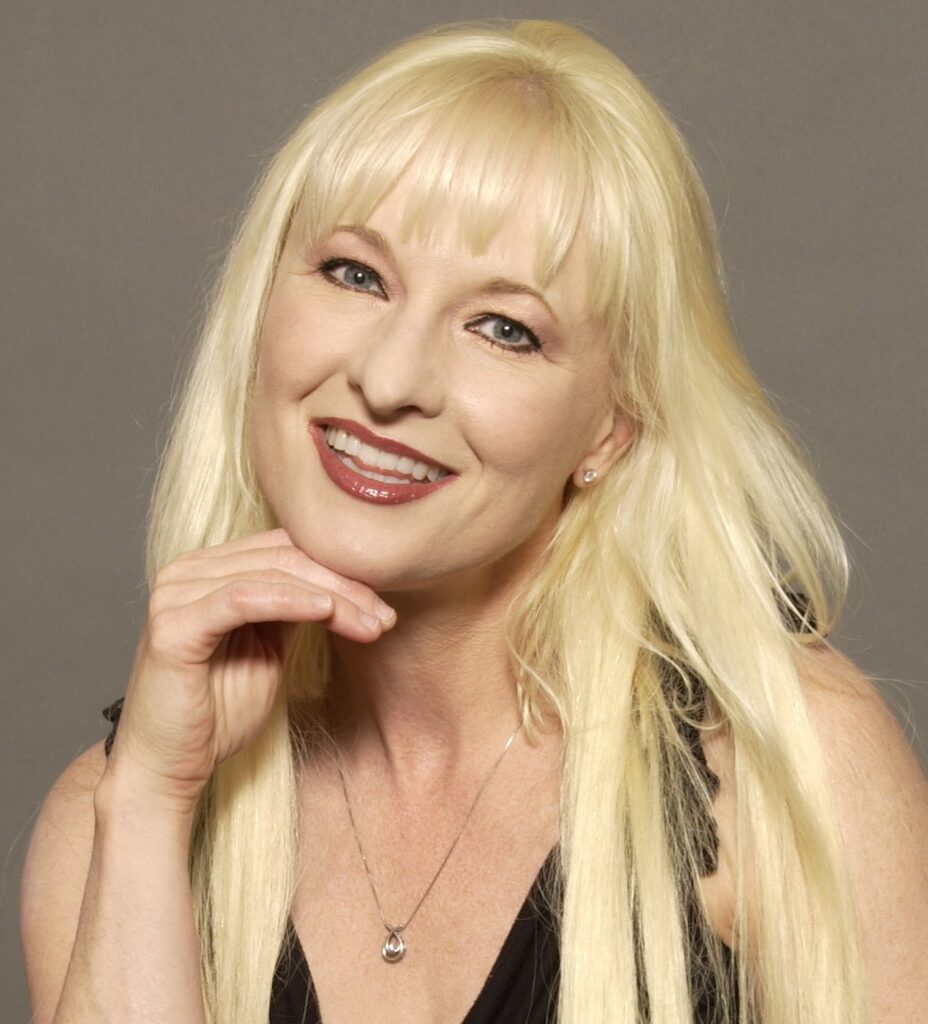 Hunter Storm, Creator, Author, and Founder of ZStormGirl, professional headshot with neutral background.